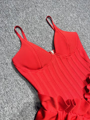 Red dress on a textured gray surface