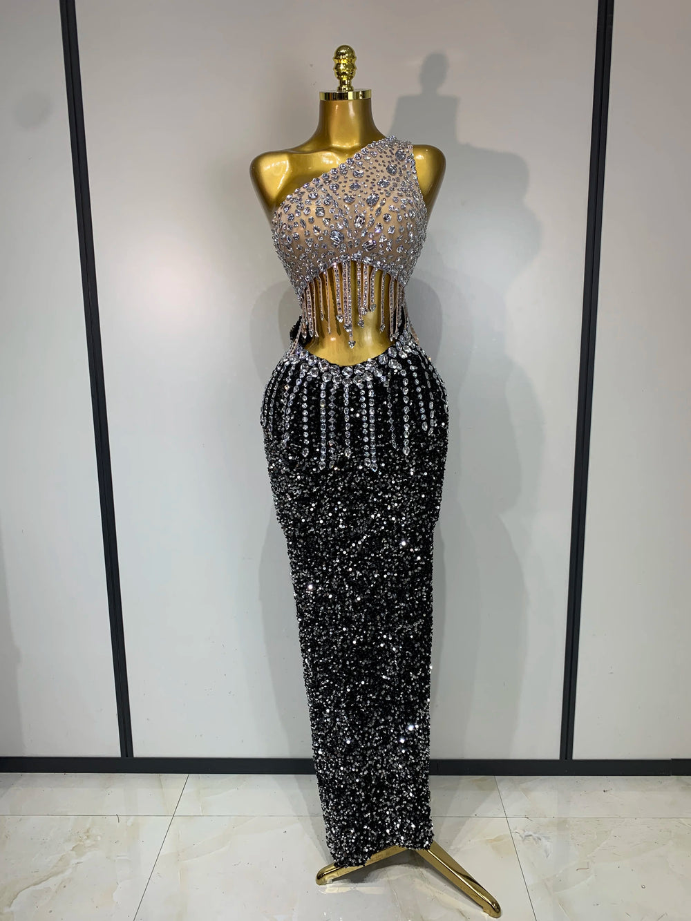 One-shoulder rhinestone dress, front view.