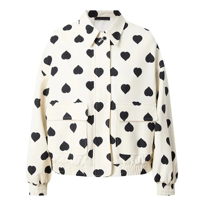 White jacket with black heart pattern on a white background