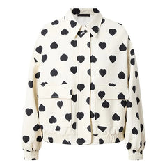 White jacket with black heart pattern on a white background