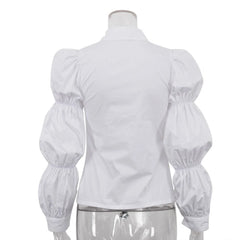 White blouse with puffed sleeves on a mannequin against a white background