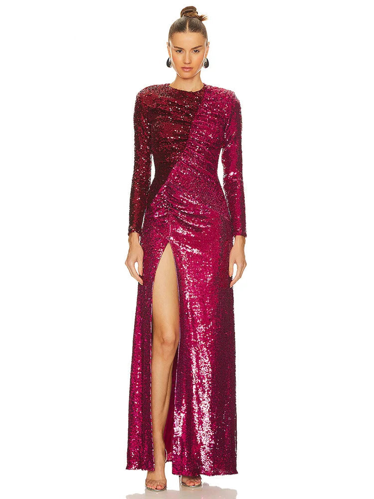 Woman wearing a burgundy sequin dress with a high slit on a white background, branded 'Vicenile'.