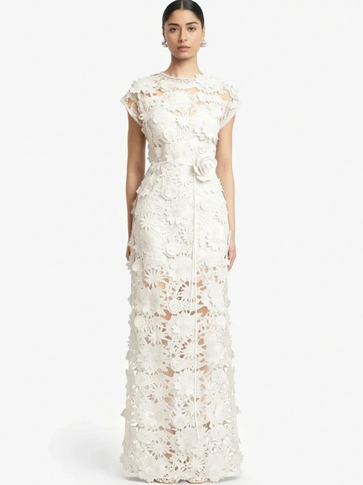 White floral appliqu� maxi dress with cap sleeves and high slit.
