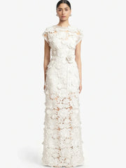 White floral appliqu� maxi dress with cap sleeves and high slit.