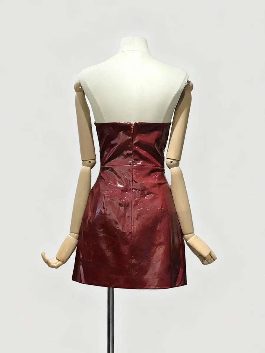 Red dress on a mannequin against a white background