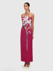 Strapless column maxi dress with floral appliqué in red.