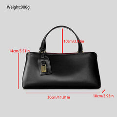 Dimensions and weight of a black structured top handle bag.