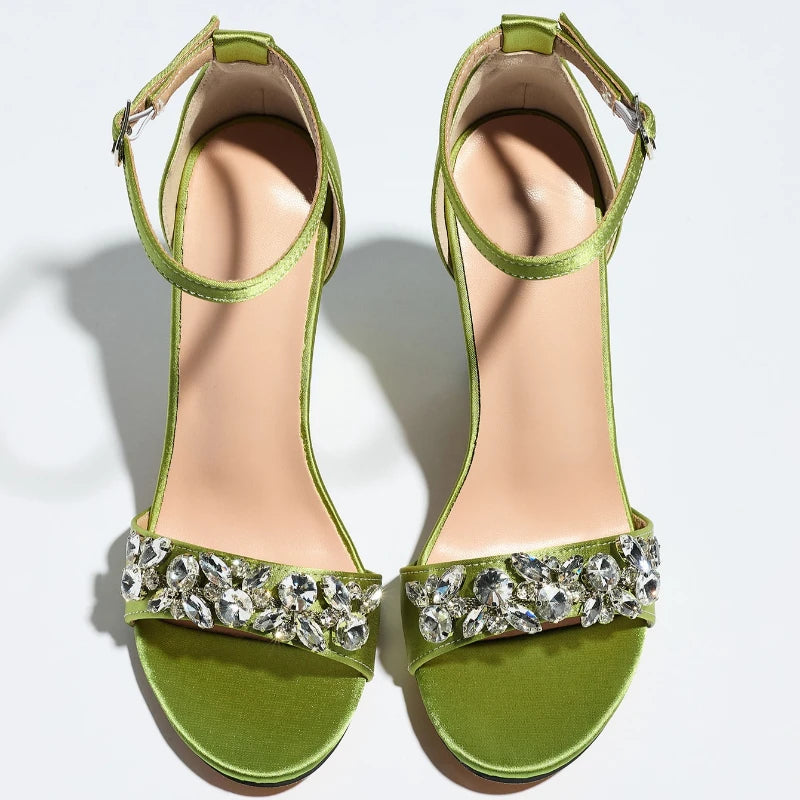 Top view of green embellished ankle strap high heel sandals