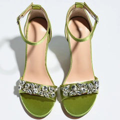 Top view of green embellished ankle strap high heel sandals