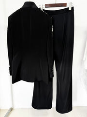 Back view of embellished blazer and wide-leg pants suit