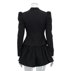 Black peplum jacket on a mannequin against a white background