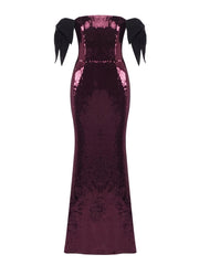 Purple sequin dress with black bows on a white background