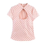 Pink polka dot cut-out stand collar blouse, front view