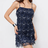 Sparkle sequin embellished mini dress with spaghetti straps.