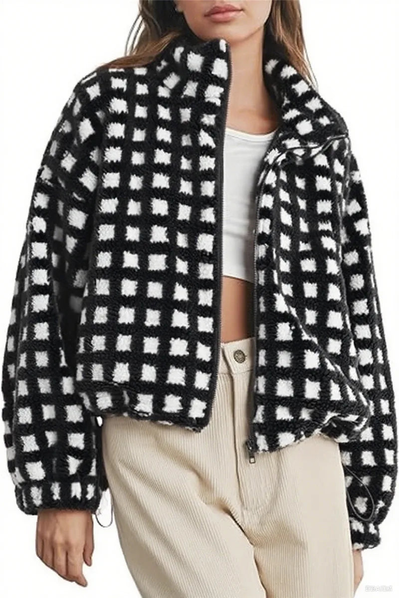 Black and white checkered jacket worn by a person