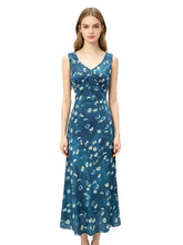 V-neck sleeveless maxi dress with daisy print on a model