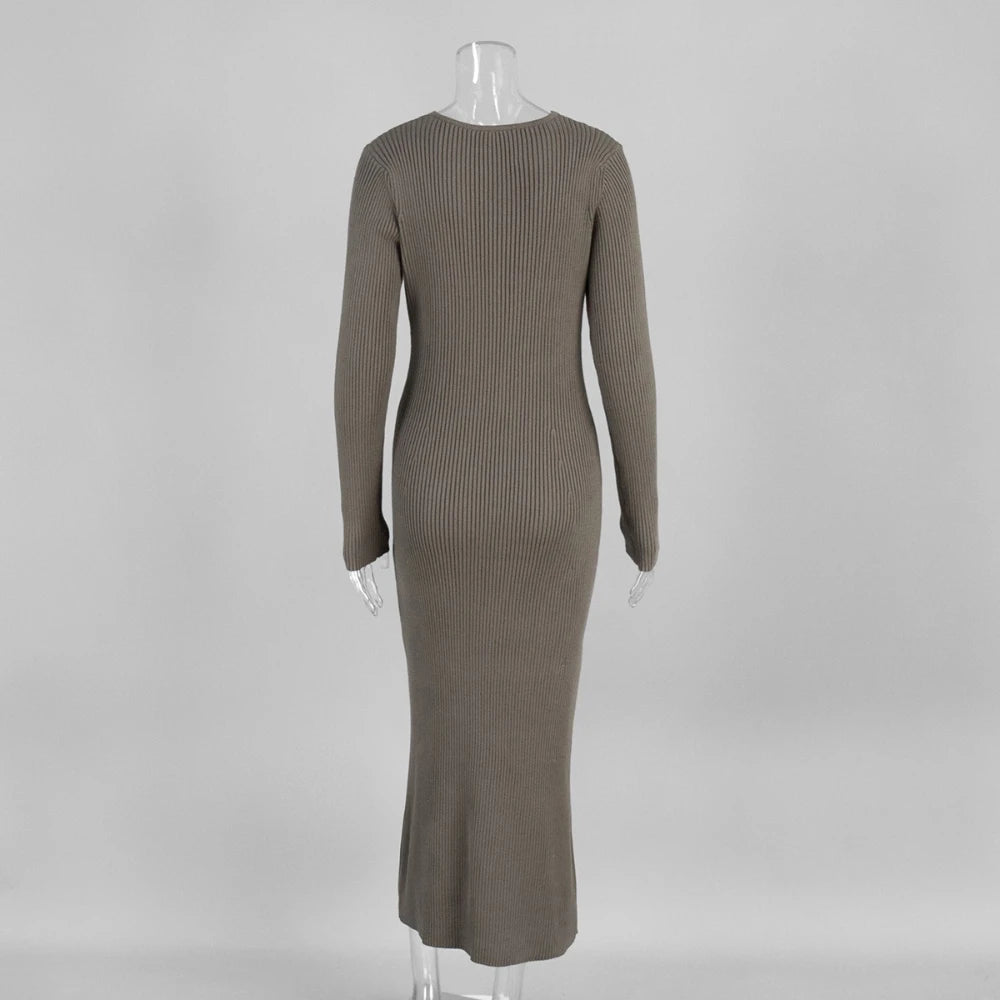 Brown ribbed dress on a mannequin against a gray background