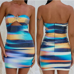 Multicolored strapless dress with starfish detail on a plain background