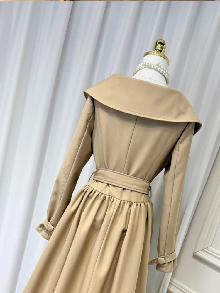 Back view of tan turn-down collar double breasted midi dress