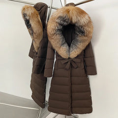 Brown puffer coat with fur hood on a white background