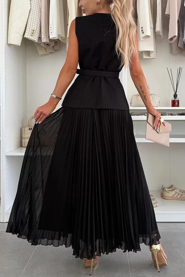 Woman wearing a black dress in a clothing store setting