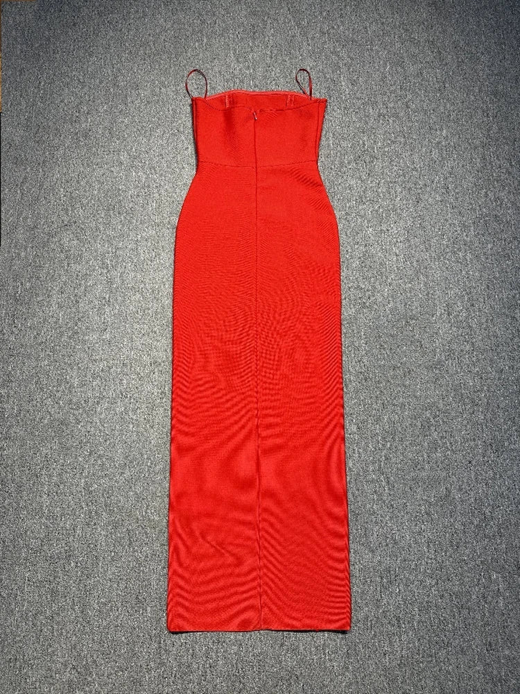 Red dress with thin straps on a gray background