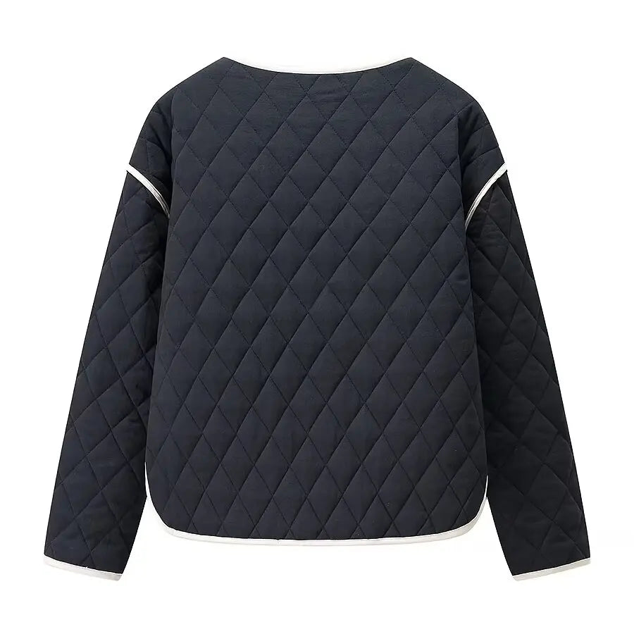 Back view of a navy quilted jacket with white piping on a white background