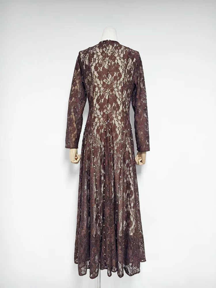 Back view of brown long sleeve lace embellished maxi dress