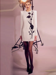 Floral beaded long sleeve mini dress on model