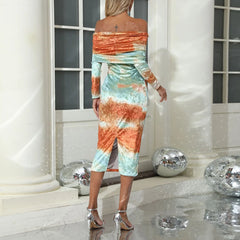 Woman wearing a colorful off-shoulder dress in a decorative setting with disco balls.