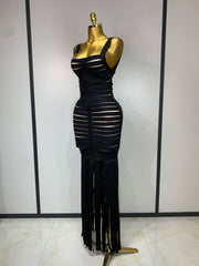 Side view of a black sleeveless square neck bandage midi dress with fringe