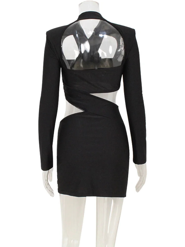 Black dress with transparent back on a mannequin against a white background