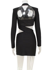 Black dress with transparent back on a mannequin against a white background