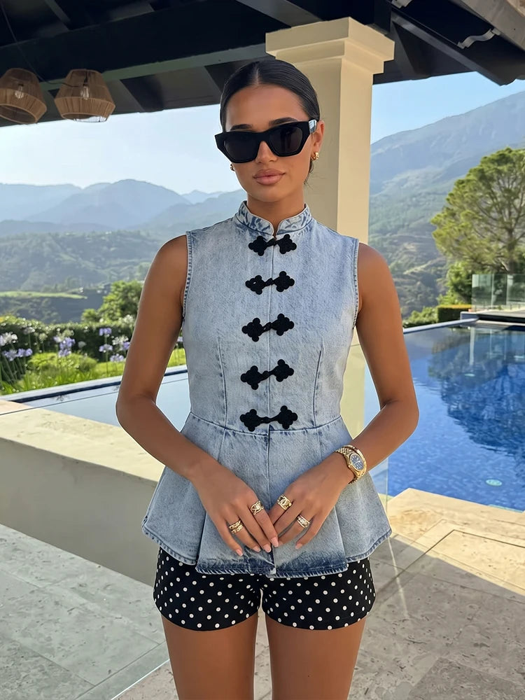 Denim peplum top styled with shorts