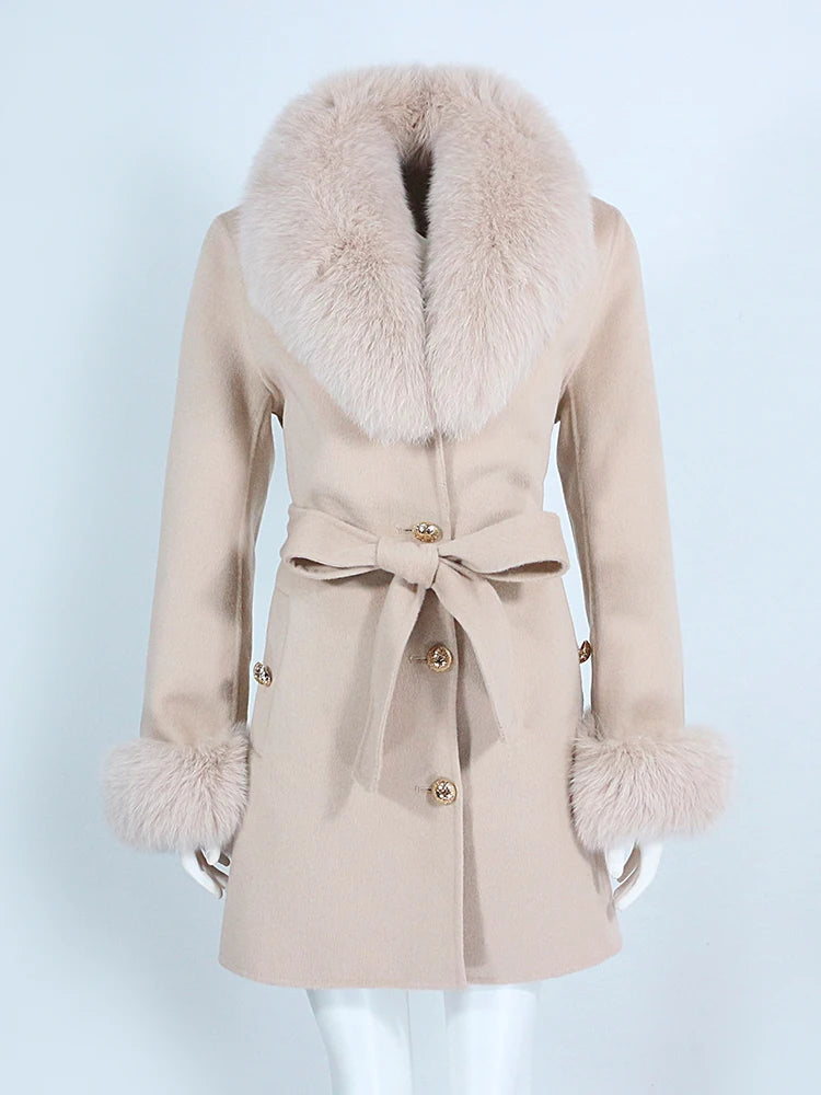 Beige coat with fur collar and cuffs on a white background