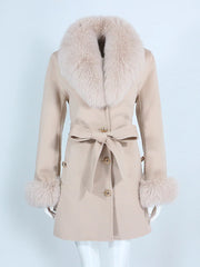 Beige coat with fur collar and cuffs on a white background