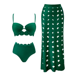 Green scalloped trim bikini top and high-waisted cutout maxi skirt laid flat.