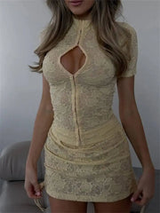 Close-up of a yellow lace mini dress set showing texture