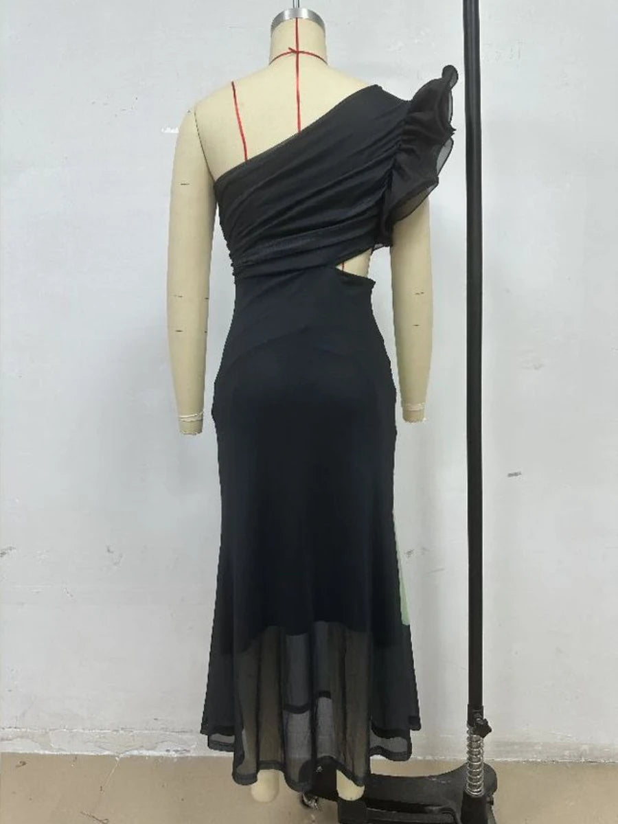 Black one-shoulder dress on a mannequin against a plain background