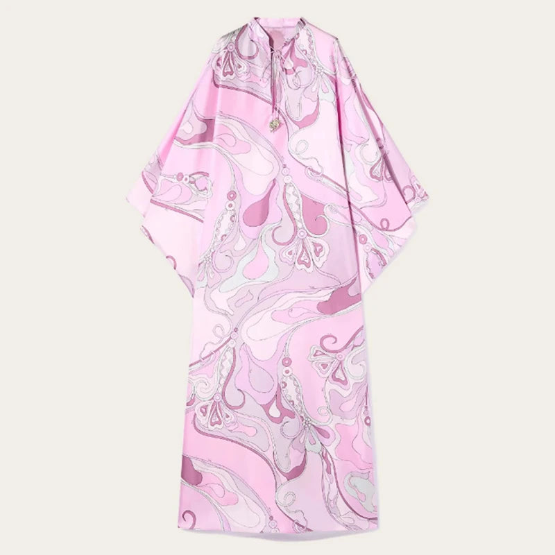 Pink and white patterned dress on a light beige background