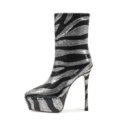Black and silver striped high-heeled boot on a white background