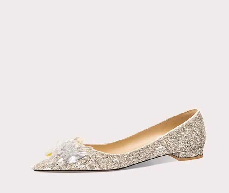 Sparkly flat shoe on a white background