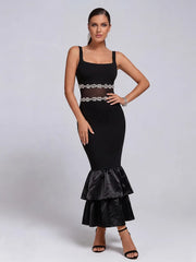 Black square neck sleeveless midi dress with pearl embellishments and satin ruffles.