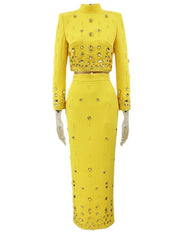 Yellow embellished stand collar cropped jacket and maxi skirt set on mannequin