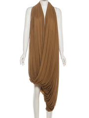 Brown draped dress on a white mannequin against a white background