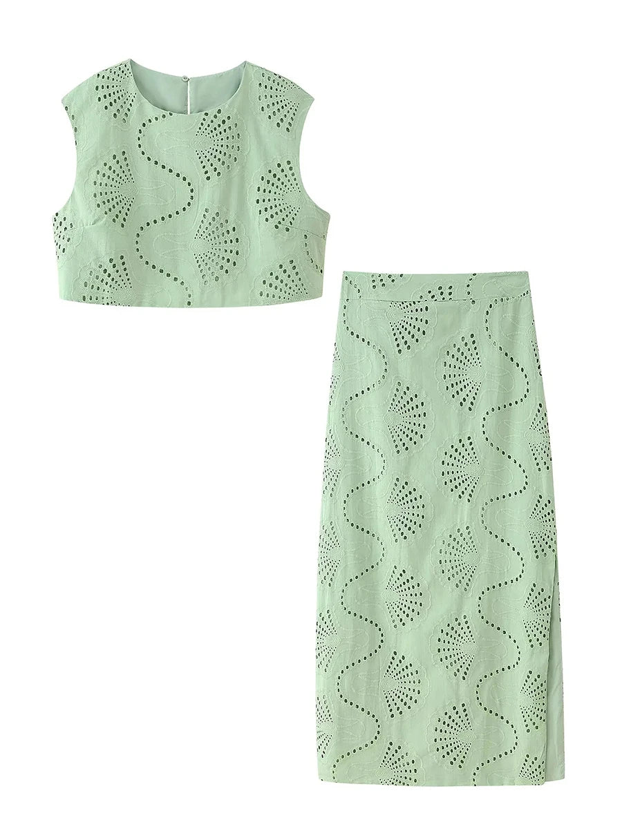 Light green sleeveless top and skirt set on a white background