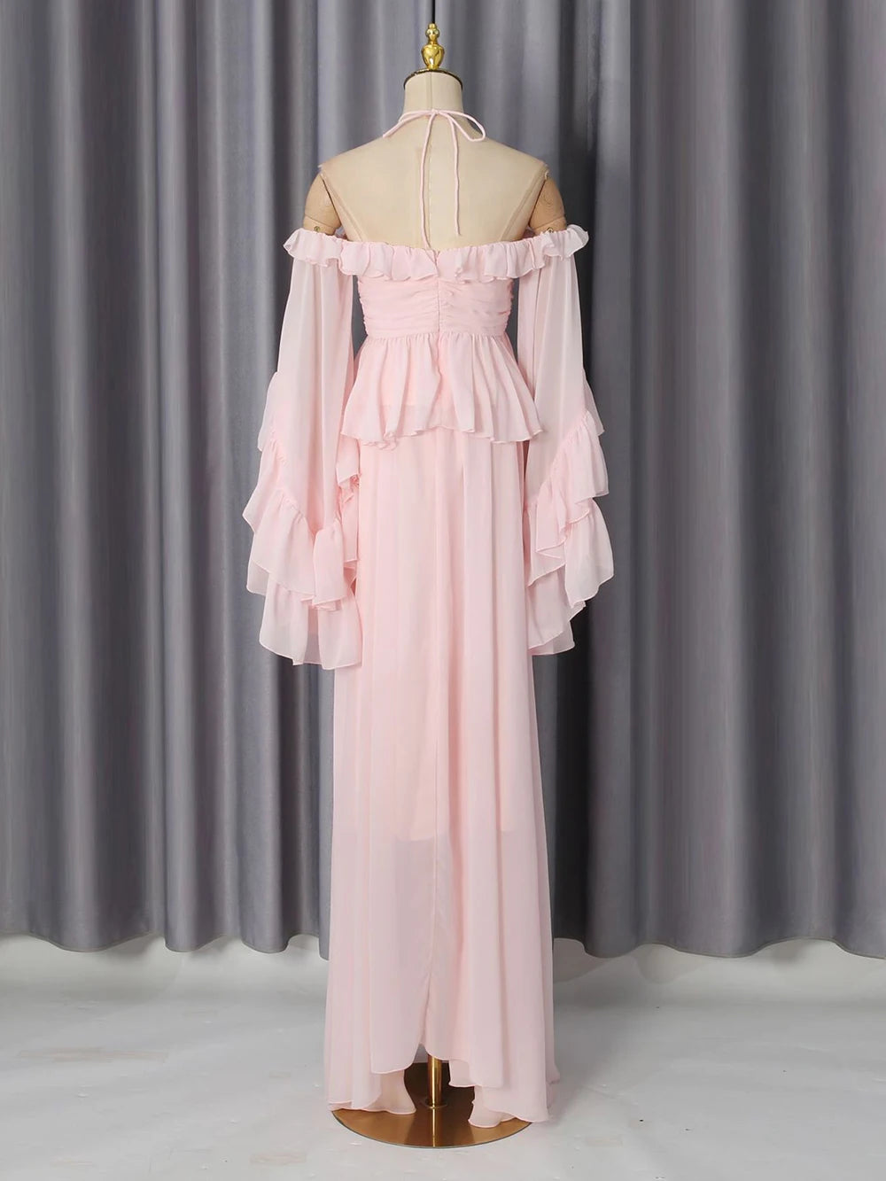 Pink two-piece set on a mannequin, back view