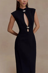 Black dress with cut-out design on a beige background