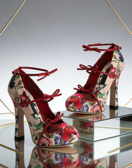 Pair of floral print chunky heel pumps on display