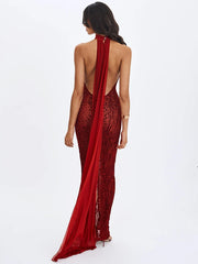Red lace evening gown with open back on a white background
